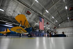 The PT-17 Stearman with Tuskegee Airmen training history sits in Hangar 3 during the Tuskegee Airmen PT-17 Aircraft Exchange ceremony at Joint Base Andrews, Md., July 26, 2023. Donated by the American Heritage Museum, this aircraft will be put into the National Museum of the U.S. Air Force inventory and displayed at Wright-Patterson Air Force Base, Ohio. (U.S. Air Force photo by Senior Airman Bridgitte Taylor)