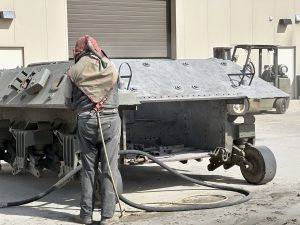 Sandblasting the outer hull of the M36 Jackson for repainting, March 2023.