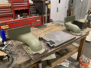 Exhaust components repainted and ready for reinstallation on the M36 Jackson.